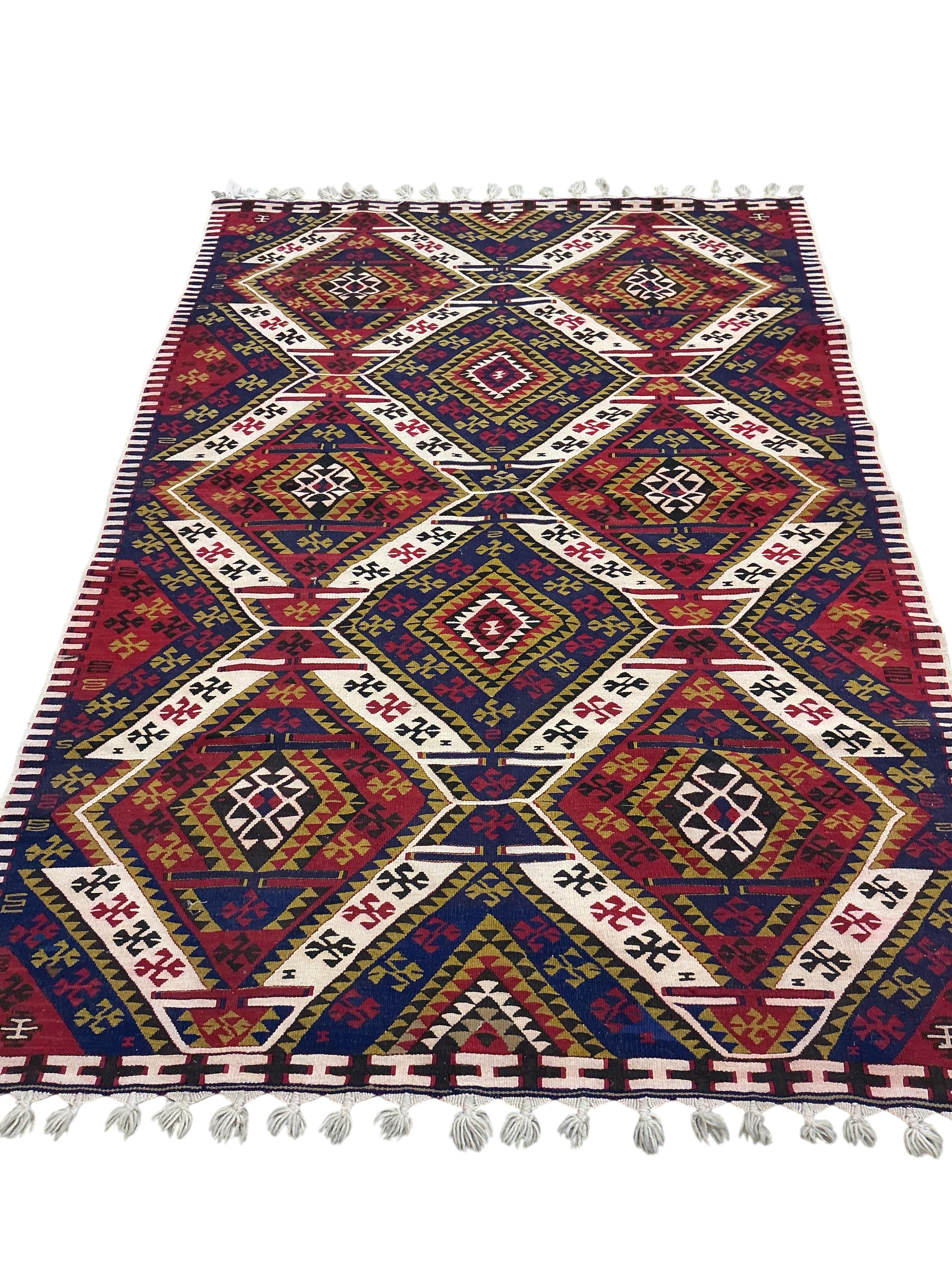 A Kilim polychrome flatweave rug, 200 x 140cm